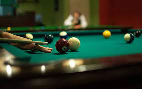 Is playing billiards for money sanctioned according to Vietnamese law?