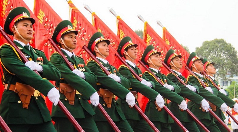 Can people wear military uniforms under Vietnam law?