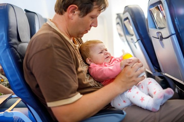 Is it okay to bring baby's milk on a plane according to Vietnamese law?